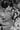 Black and white photo of pears being given to people during World War II